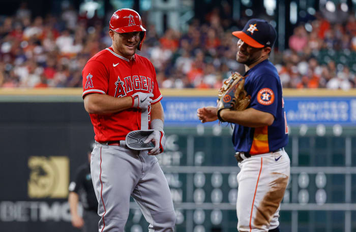 Mike Trout talks with Houston Astros second baseman Jose Altuve.